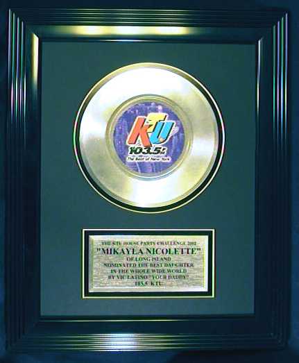 7 inch platinum record with large black frame